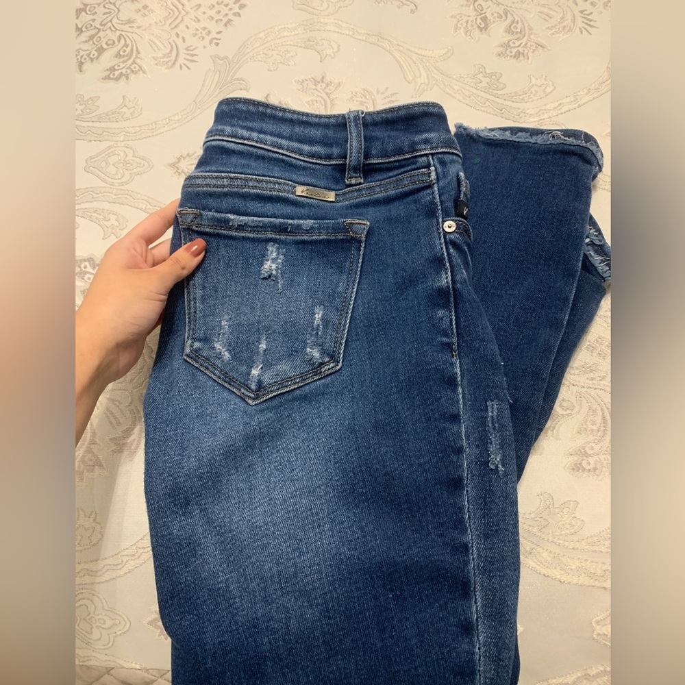 Dark blue denim mid rise jeans. Size 9/28
